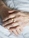 Hands of elderly lady with golden ring-series of photos Royalty Free Stock Photo